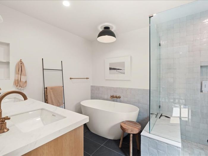 Primary bathroom remodel freestanding tub custom tile South Bay